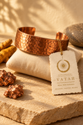 VATAH Copper Cuff — product on cushion